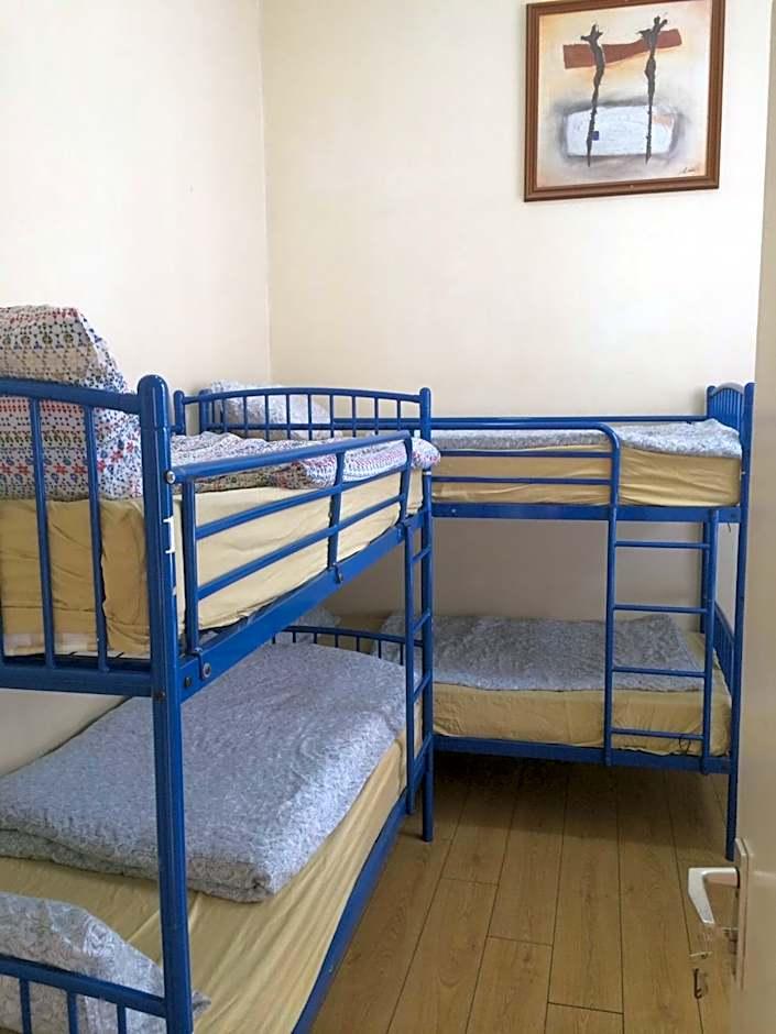 Posto Letto Singolo in Dormitorio Misto con 6 Letti